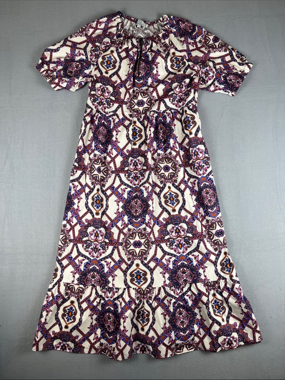 Charleston Shoe Co. Boho Printed Midi Dress in Cream and purple
Size: Medium